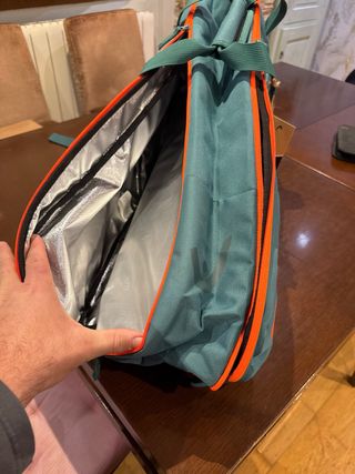 Raquetero HEAD verde y naranja sin usar.