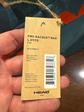 Raquetero HEAD verde y naranja sin usar.
