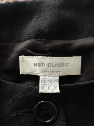 Chaqueta negra botones