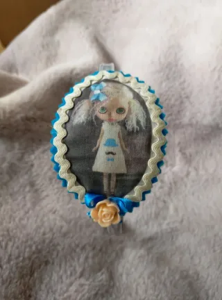 Diadema con muñeca y flor