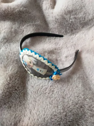 Diadema con muñeca y flor