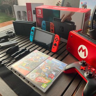 Nintendo Switch + Controller + 2 Giochi + Ring Fit