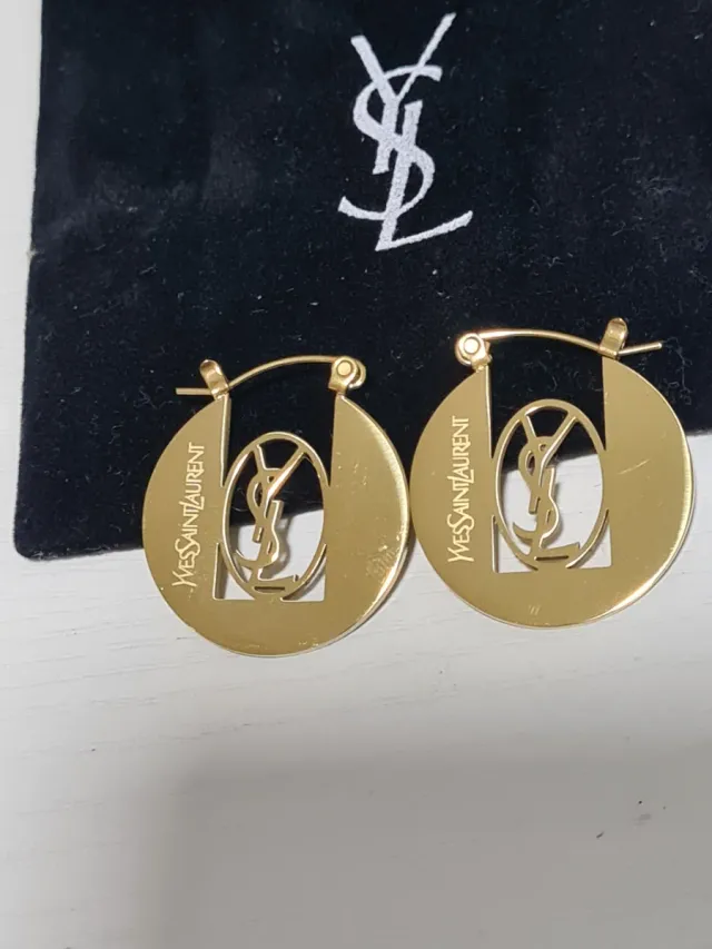 Pendientes Yves Saint Laurent dorados