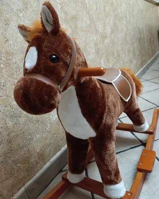 Caballito balancín con música como nuevo
