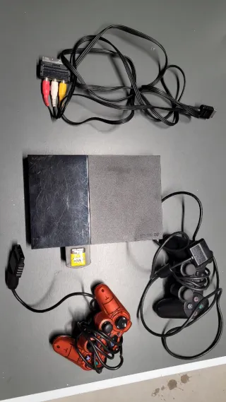 Console Sony PS2 con controller e cavi