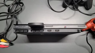 Console Sony PS2 con controller e cavi