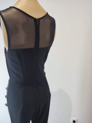 Mono negro fiesta con botones dorados