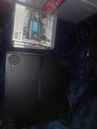 PS3 Slim 160GB con caja y juegos