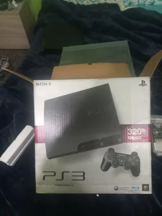 PS3 Slim 160GB con caja y juegos