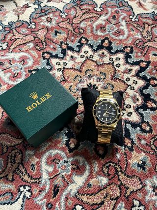 Reloj Dorado y Negro