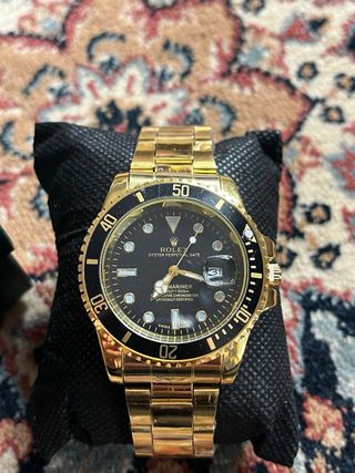 Reloj Dorado y Negro