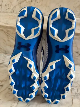 Tacos de béisbol Under Armour blancos y azules