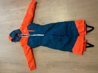 Mono de nieve azul y naranja talla 4