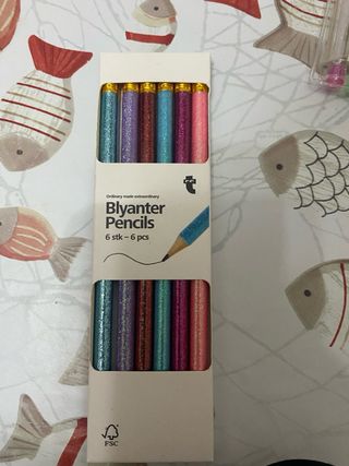 4 confezioni penne e matite glitter