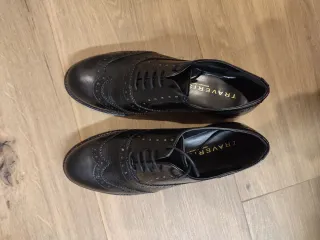 Mocasines negros de piel para mujer