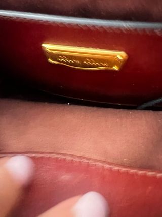 Borsa Miu Miu in pelle marrone invecchiata dorata
