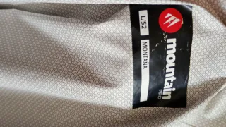 Cortavientos montaña gris. Hombre Gris