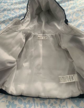 Abrigo bebé azul marino con capucha