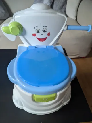 Orinal bebé con porta rollos