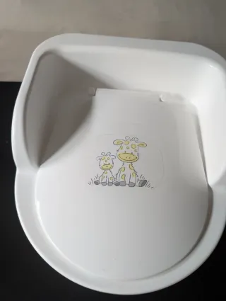 Orinal bebé con respaldo usado dos veces