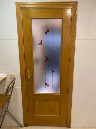 Puerta interior acristalada de roble maciza