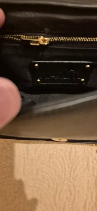 Bolso de fiesta Starlite negro con tachuelas dorad