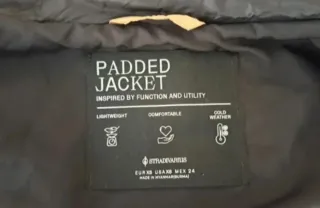 Chaqueta acolchada beige y negra