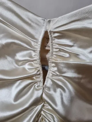 Blusa drapeada manga larga champagne.