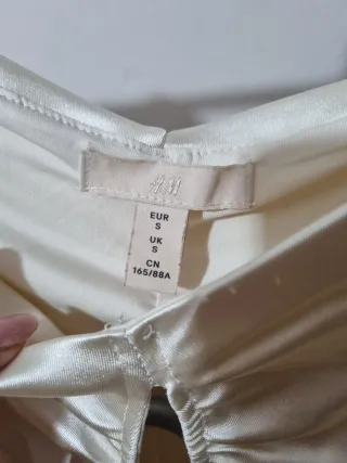 Blusa drapeada manga larga champagne.