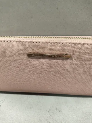 Cartera Stradivarius rosa