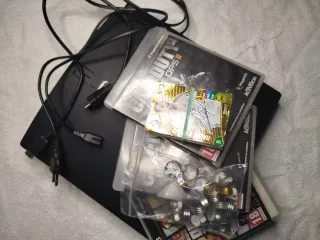 OFFERTA!! PS3 Slim Nera + Giochi e Accessori