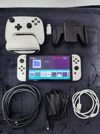 Nintendo Switch OLED + 54 Giochi