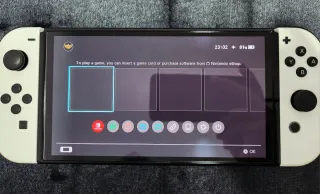 Nintendo Switch OLED + 54 Giochi