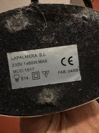 Lámpara de sobremesa con pie de  acero.