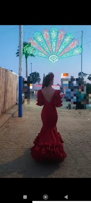 Traje de flamenca rojo volantes