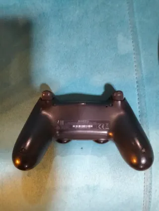 PS4 Slim Nera + 2 Controller + Cavi + 1 gioco