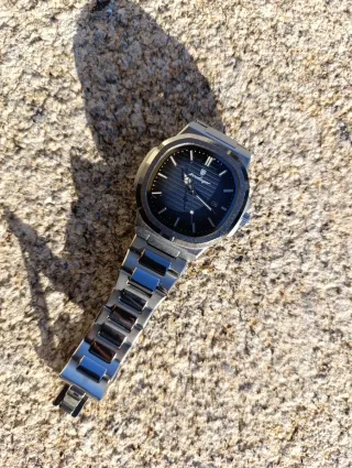 Relógio Poedagar Azul e Prata