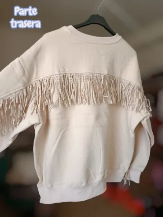 Sudadera beige con flecos