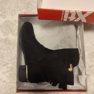 Botines combinados negro y dorado