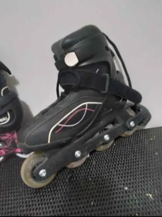 Patines Oxelo negros con detalles rosa