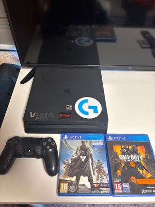 PS4 con su caja + Mando + 2 Juegos