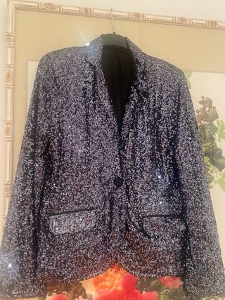 Americana lentejuelas plateada y negro .