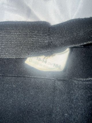 Pantalones negros con botones