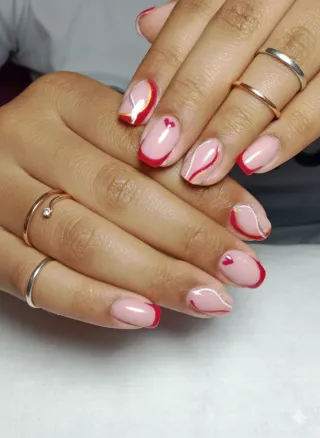 Uñas acrílicas diseño cerezas y oro