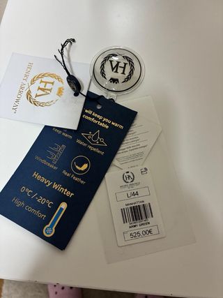 Plumas verde con capucha y pelo