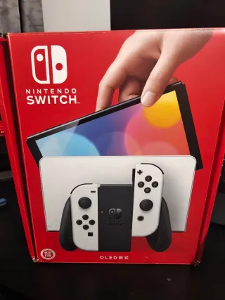 23 giochi + Nintendo Switch OLED Bianca + 256gb