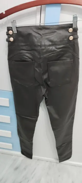 Pantalón polipiel y jersey talla 36/38