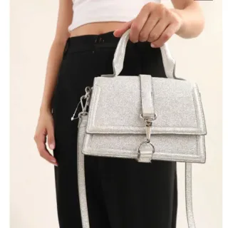 Mini bolso fiesta plateado. H&M