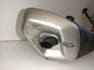 Escape silencioso Benelli BN 125 de 2024