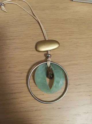 Pendientes de plumas y collar